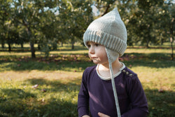 Collection of Tuque en laine de mérinos à cordons - 3-12 M - gris - Timininous in a gallery layout